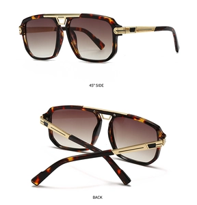 Macro detail of retro aviator sunglasses with tortoiseshell frame and gold metal hinges
