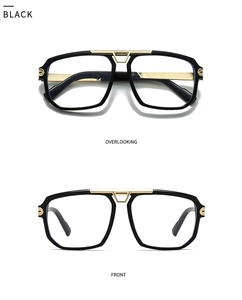 Detail view of large-frame pilot sunglasses with gold V-shaped bridge decoration