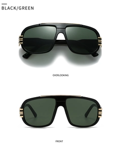 Detail view of retro oversized black sunglasses with green lenses and gold metal accents