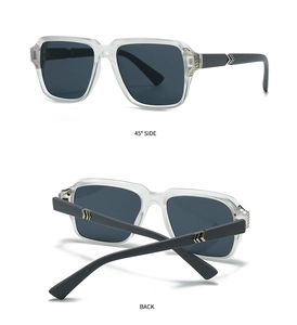 Detail view of transparent square sunglasses with silver arrow metal accents on the side