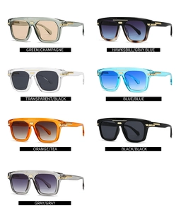 Vertical array of seven oversized square sunglasses in various gradient frame colors