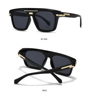 Detail view of square black sunglasses featuring gold lightning metal accents and gray lenses