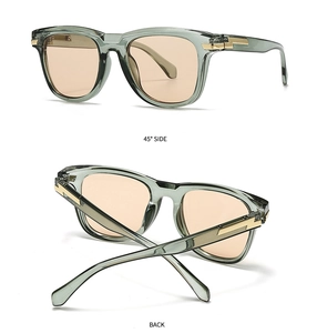 Details von modernen Retro-Quadrat-Sonnenbrillen mit goldenem Blitz-Scharnier und Gläsern