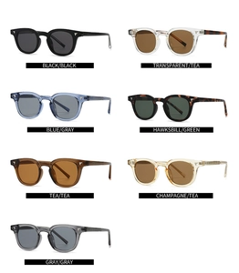 Detail view of vintage square sunglasses in seven assorted colors with metal wing rivets