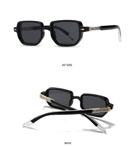 Detailansicht schwarzer Vintage-Sonnenbrille mit transparenten Bügeln und goldenem Metallkern