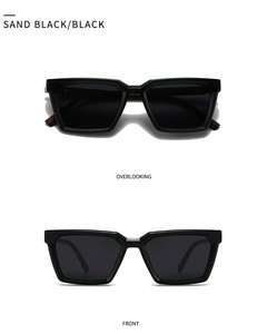 Détail macro des lunettes de soleil noires mates avec pont métallique argenté
