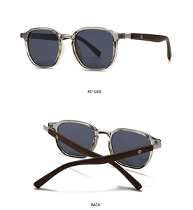 Retro polarized sunglasses detail with smoky grey frames and dark brown wood temples