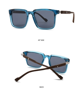 Detail view of blue transparent sunglasses with wood grain temples and silver arrow logo
