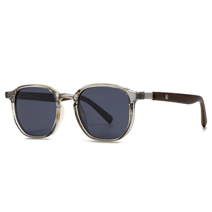 Retro polarized sunglasses with grey translucent frame and brown wood temples