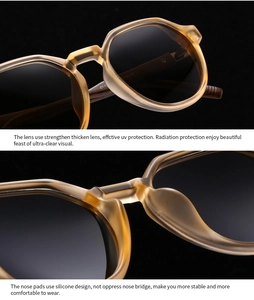 Detail of polarized sunglasses with reinforced UV lenses and integrated silicone nose pads