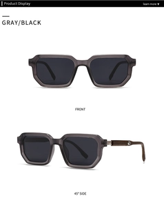 Macro detail of polygon sunglasses featuring translucent grey frames and wood grain temples