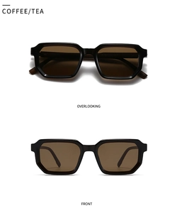 Close-up of retro polygon sunglasses with tea-colored lenses and black thick frame details