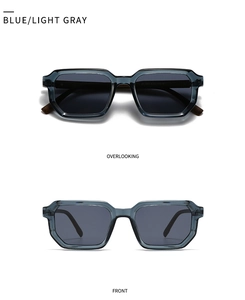Close-up of translucent gray-blue hexagonal frame sunglasses with detailed temple specs