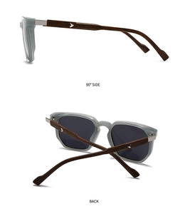 Detail view of modern sunglasses showing 90-degree side and back with wood grain texture