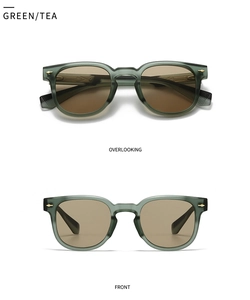 Detail of green matte sunglasses with tea lenses and golden arrow metal accents