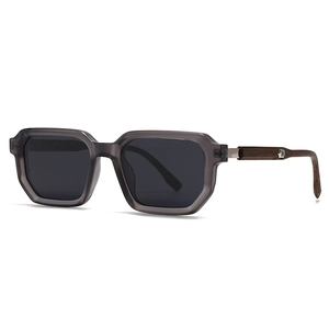 Retro polygon sunglasses with translucent grey frame and brown wood grain temples
