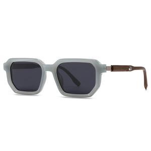 Retro polarized sunglasses with light gray transparent frame and wood texture temples