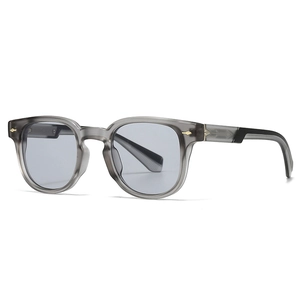 Retro small square sunglasses with smoky grey translucent frames and gold arrow rivets