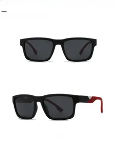 Macro detail of square polarized sunglasses featuring red and white striped temples