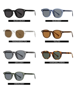 Collection of seven retro round sunglasses in various frame colors with metallic hinge details