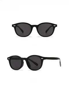 Front and 45-degree side views of black retro round sunglasses with silver rectangular studs
