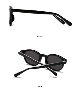 Detail view of vintage round sunglasses showing 90-degree side and folded back profile