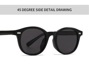 Detailed 45-degree side view of vintage round sunglasses with silver temple accents
