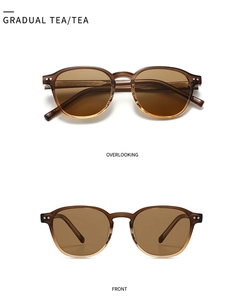 Detail view of gradual tea retro sunglasses with dual metal rivets and sleek resin frame