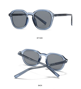 Detail of blue acetate sunglasses frame featuring intricate diamond pattern on the temples