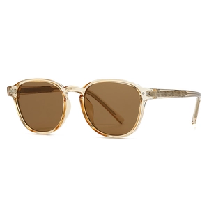 Vintage round-frame amber sunglasses with transparent finish and brown lenses