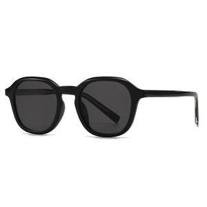 Classic black full-frame retro sunglasses with glossy finish and dark lenses for street style