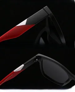 Primer plano de gafas de sol cuadradas con bisagras reforzadas y detalles en rojo