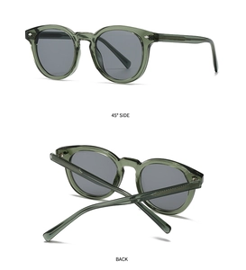 Detailed 45-degree side and back view of vintage green round sunglasses with silver rivets