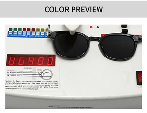 Close-up of black sunglasses undergoing UV400 protection test on professional device