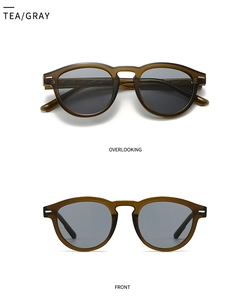 Detail view of tea brown vintage sunglasses with gray lenses and textured temples