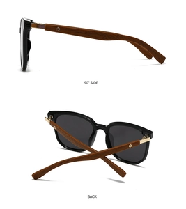 Detail view of round polarized sunglasses with black frames and brown wood grain temples