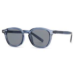 Vintage round blue transparent sunglasses with grey lenses and silver metal accents