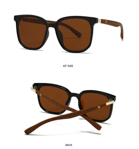 Close-up of wood grain temples and polarized lenses on classic round frame sunglasses
