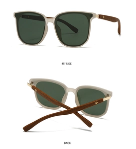 Close-up of translucent grey sunglasses with wood grain temples and gold hinges