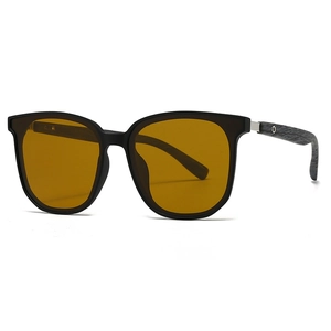 Polarized sunglasses with black round frame, amber lenses, and wood grain temples