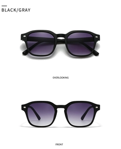 Modern square double bridge sunglasses with matte black frames and grey gradient lenses