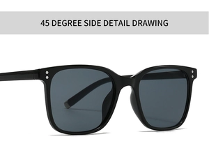 Detail view of square black sunglasses with silver rivets at a 45-degree angle