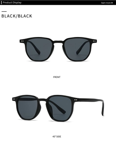 Détail de lunettes de soleil rondes rétro modernes avec monture noire et rivets en argent