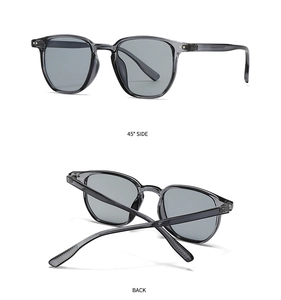 Détails des lunettes de soleil rondes rétro avec monture grise et verres foncés