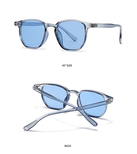 Détail de lunettes de soleil rétro avec monture grise translucide et verres bleus