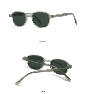 Detail view of retro square translucent grey sunglasses with dark green lenses and frames