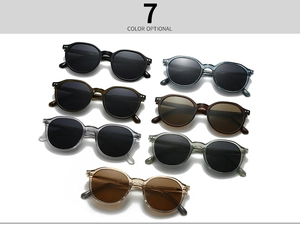 Flat lay view of retro round sunglasses in seven various frame colors for selection