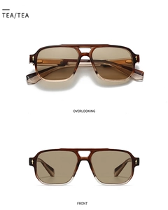 Gros plan sur lunettes de soleil aviateur couleur thé avec double pont et détail flèche