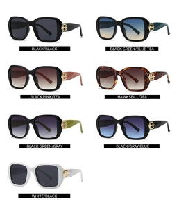 Square fashion sunglasses display featuring various lens colors and gold logo accents
