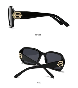 Side and back view of square sunglasses featuring a gold embossed logo on the black temples